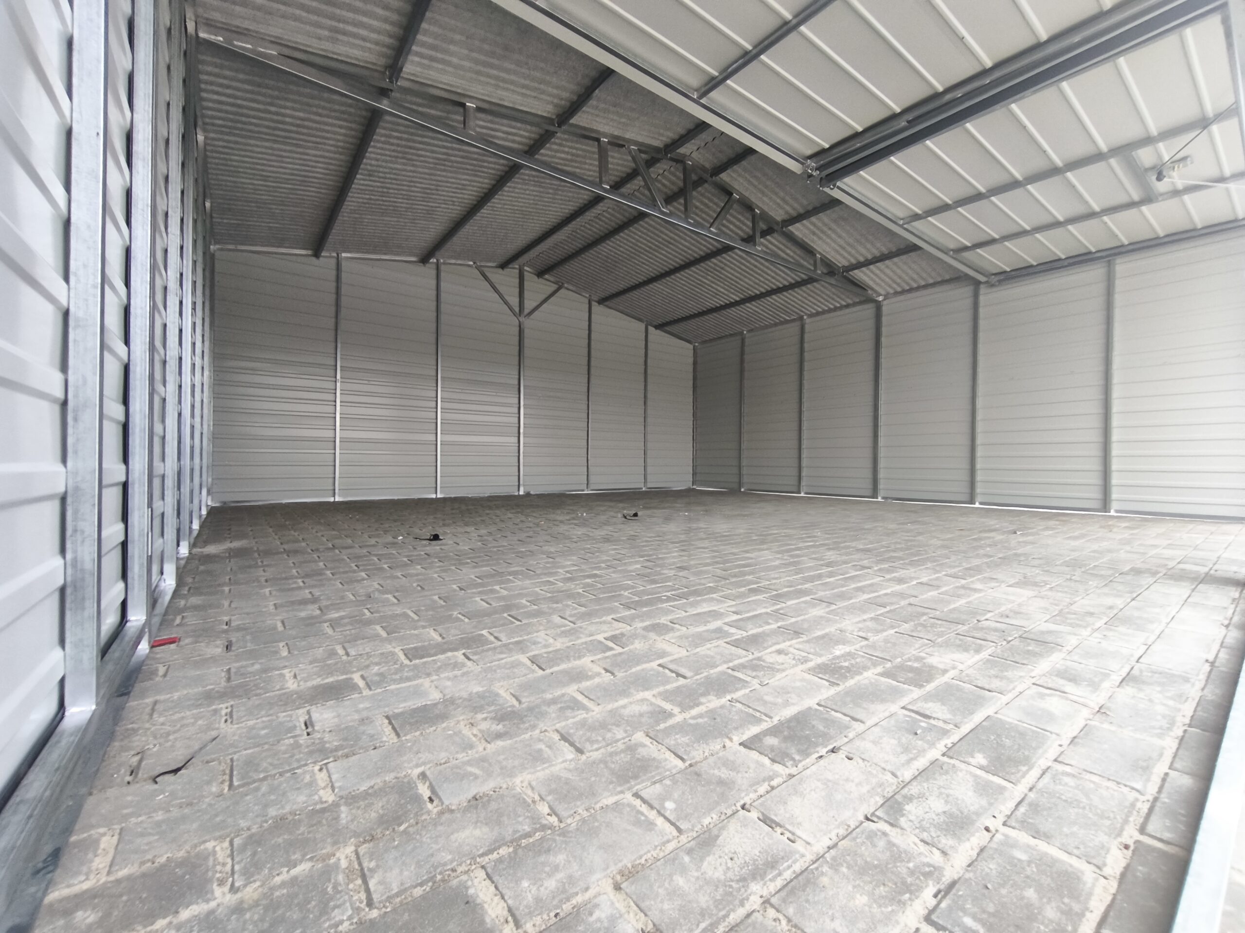 Garaż blaszany na zgłoszenie, 6x5,8m, do 35m2, grafit mat, dwie bramy uchylne, drzwi, okno, wzmocniony profilem zamkniętym ocynkowanym